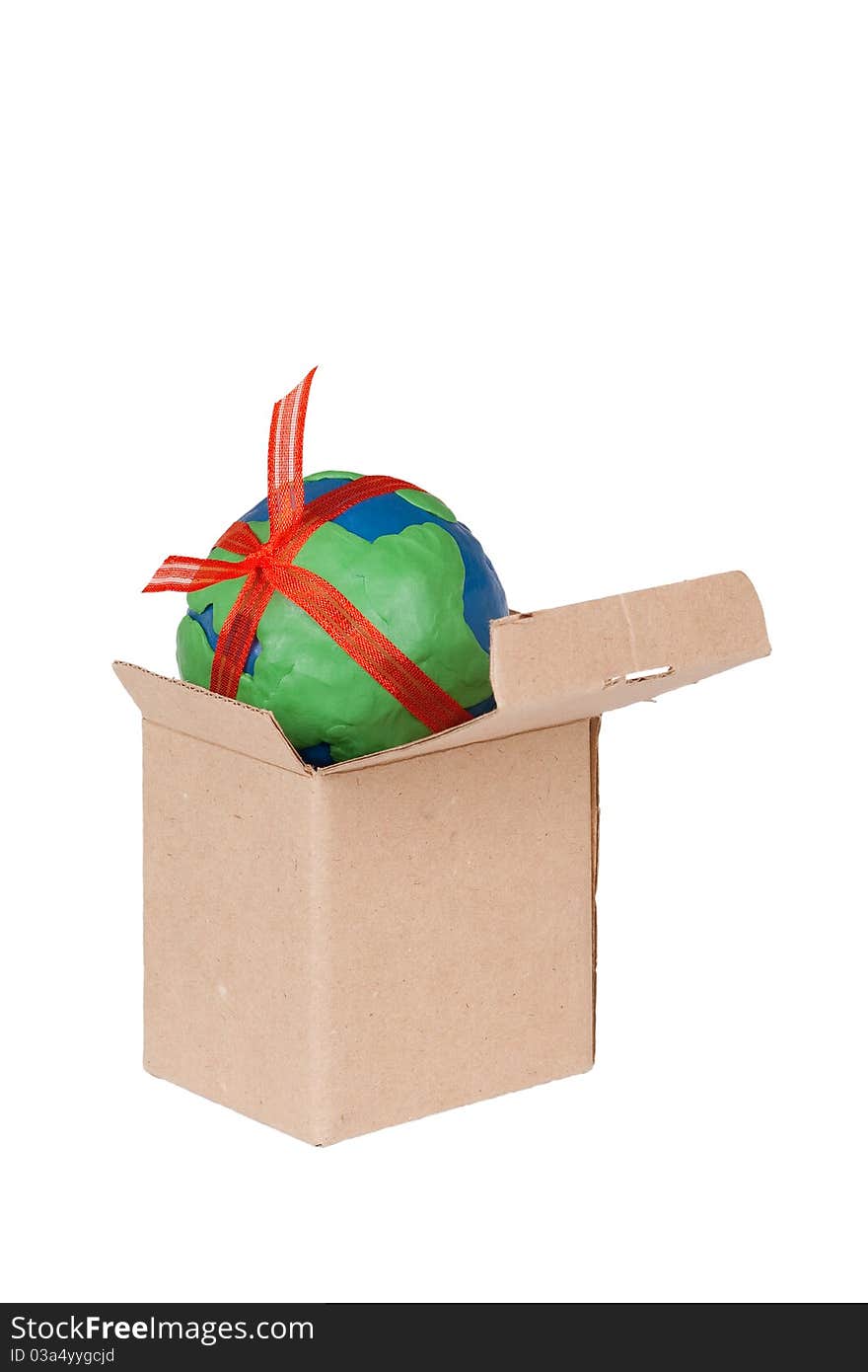 Plasticine globe in a box, standing on a white background. Plasticine globe in a box, standing on a white background