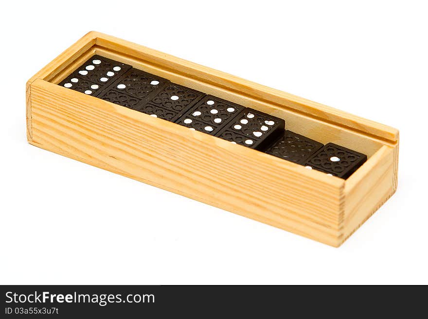 Dominos In A Wooden Box Isolated On White Backgrou