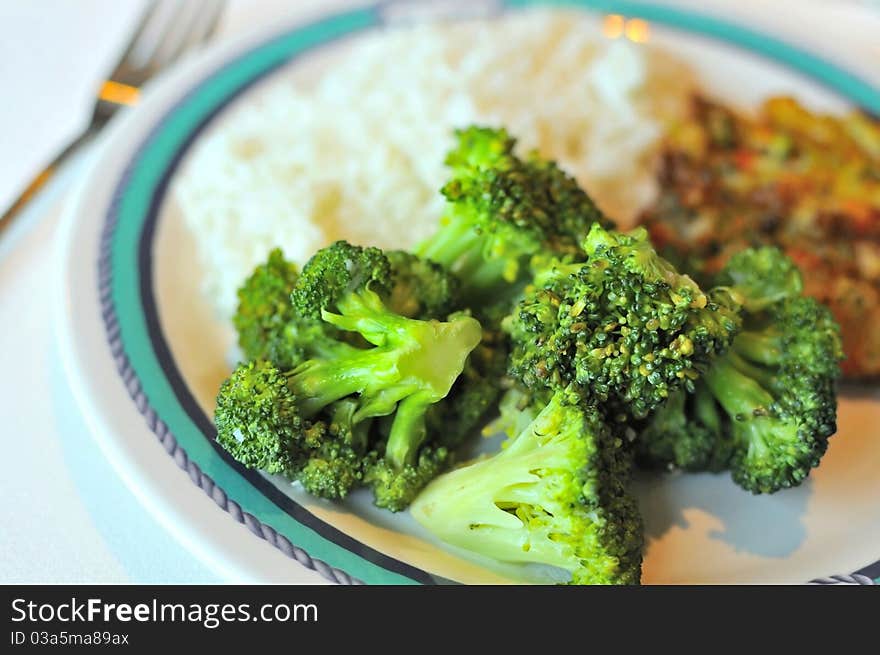 Vegetable rice set of white rice and healthy broccoli delicacy.