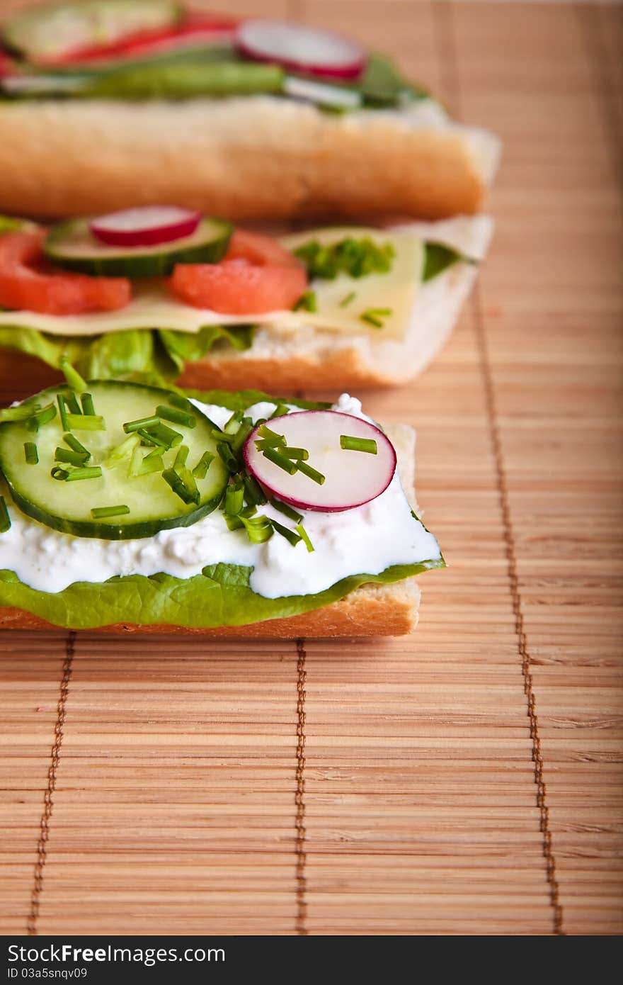 Different sandwiches with vegetables and cheese isolated