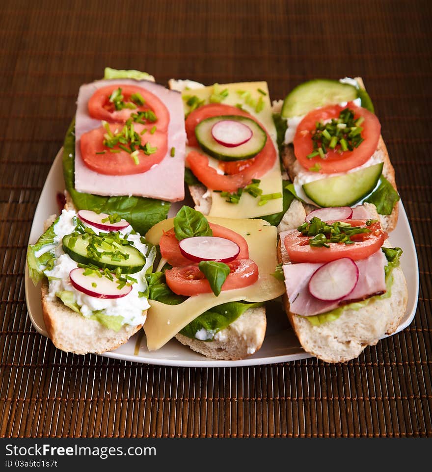 Different sandwiches with vegetables and cheese isolated