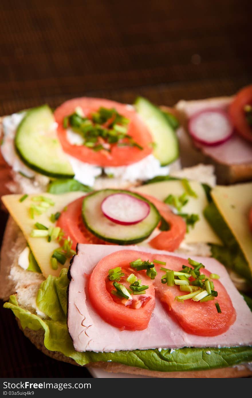 Different sandwiches with vegetables and cheese isolated