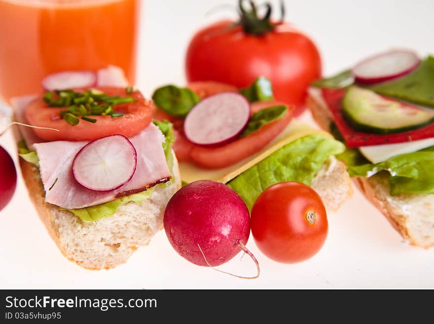 Different sandwiches with vegetables and cheese isolated