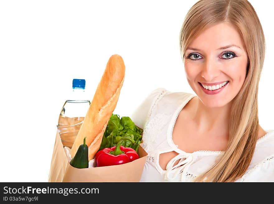 Woman carrying bag of groceries