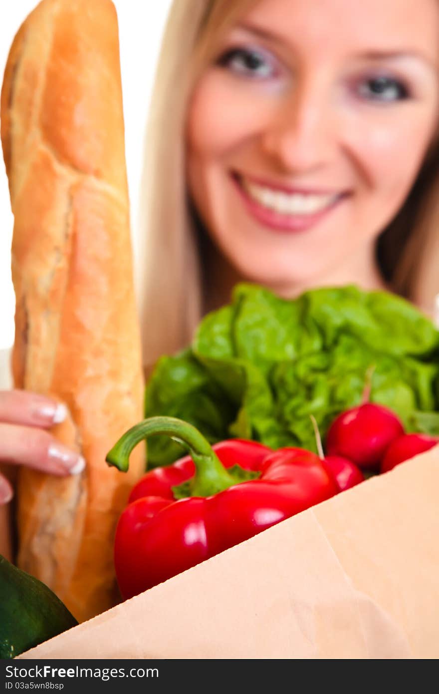 Woman Carrying Bag Of Groceries