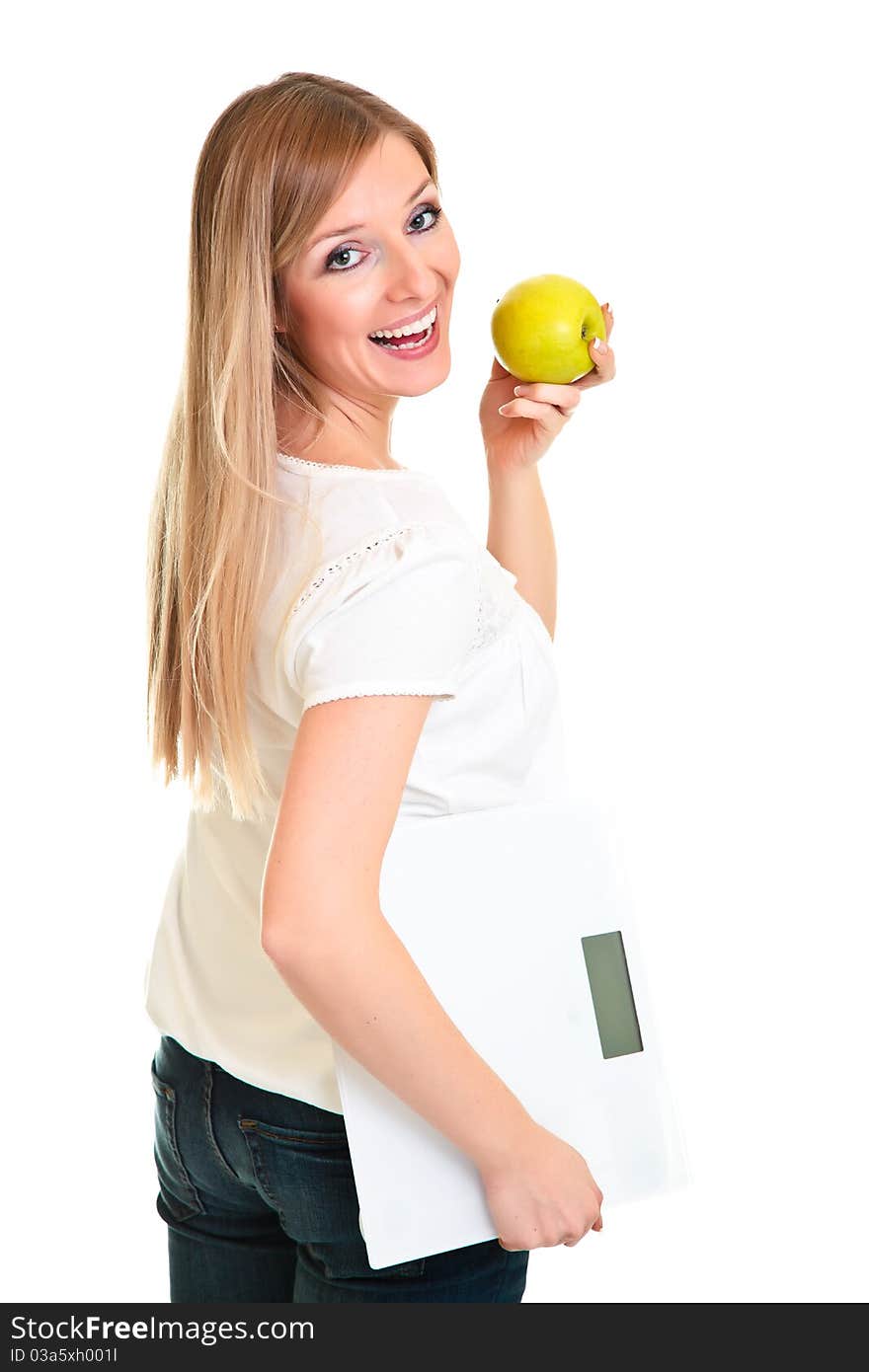 Woman with salad and scales isolated on white