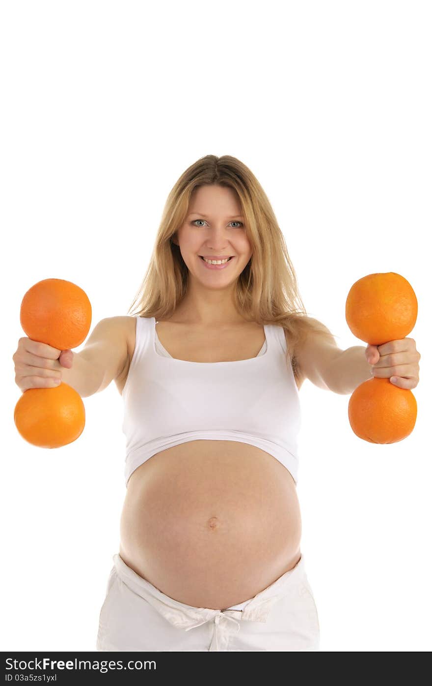 Pregnant women involved in fitness oranges