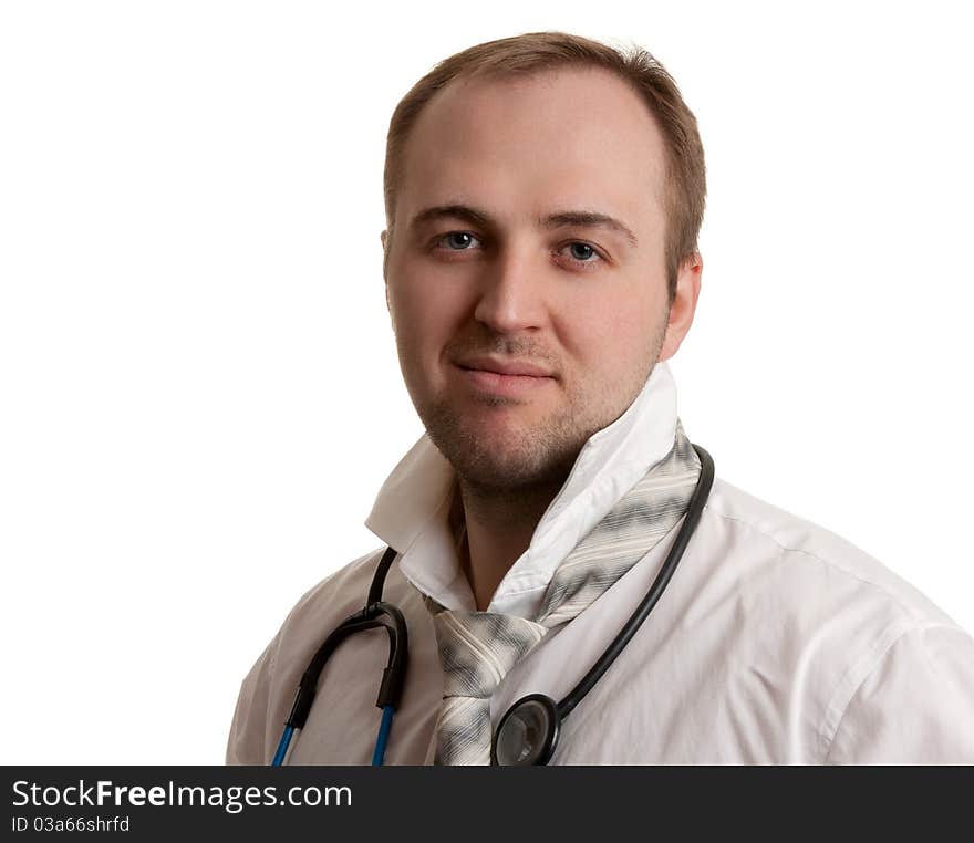 Mad doctor a stethoscope on a white background