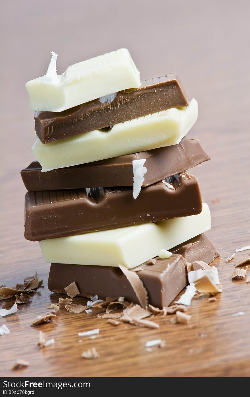 Chocolate pieces on wood table