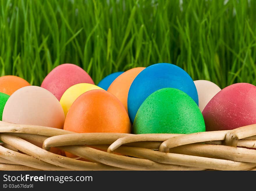 Easter eggs on basket closeup