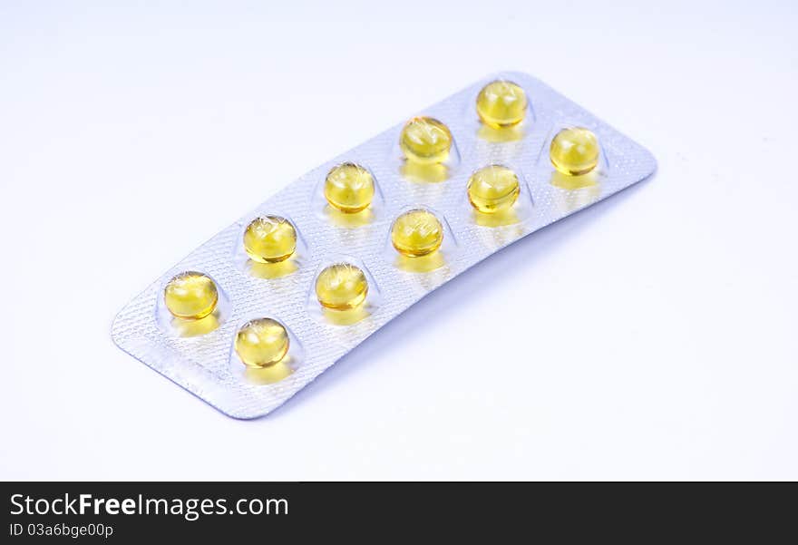 Close up medical capsules on white background