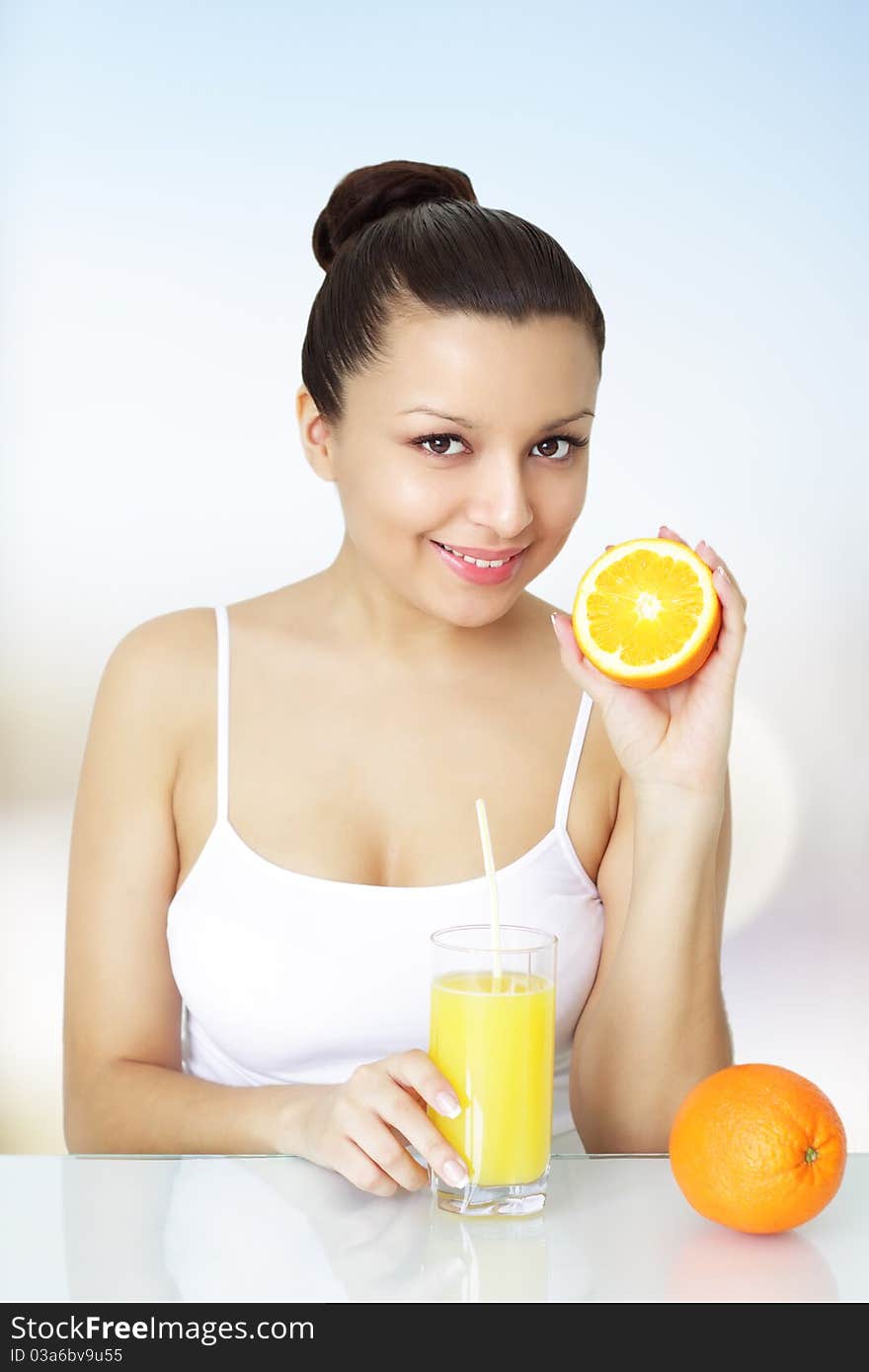 Girl with fresh orange juice. Girl with fresh orange juice