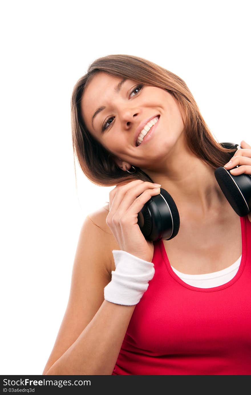 Brunette woman listening and enjoying music