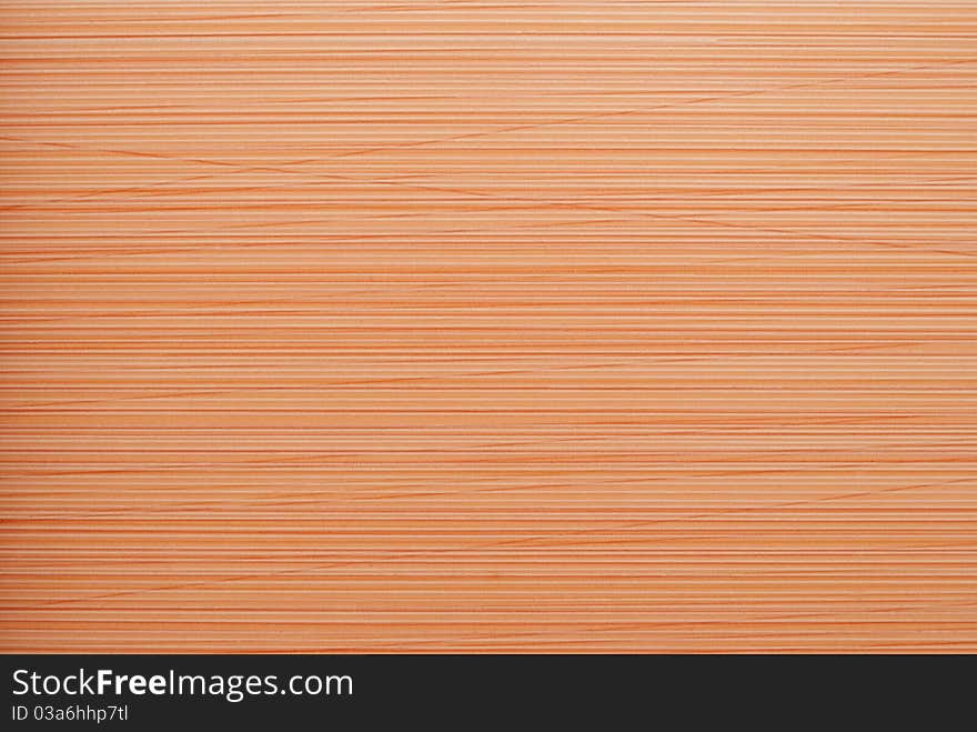 Background of red and beige horizontal stripes.