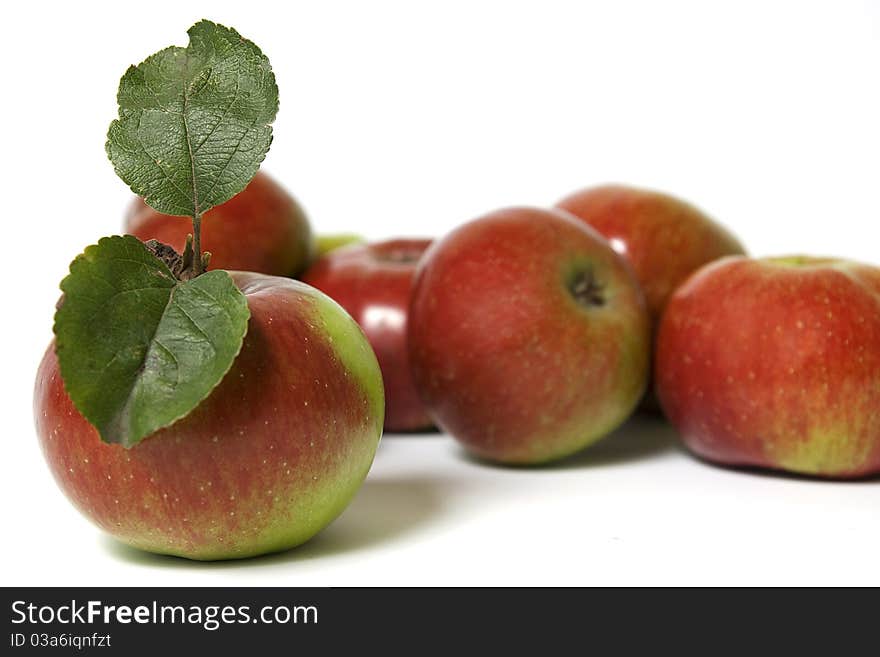 Apples with green leafs