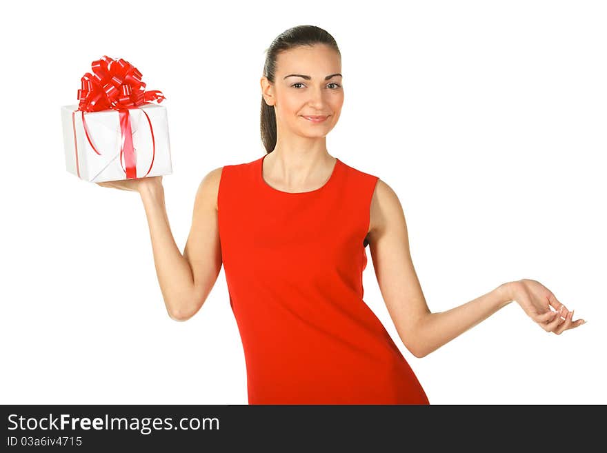 Young elegant female in red pencil-dress holding present box isolated on white. Young elegant female in red pencil-dress holding present box isolated on white