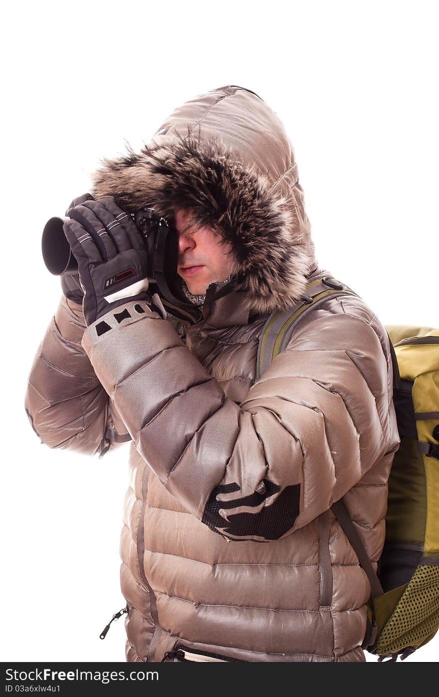 Traveller in winter clothes and with camera (isolated on white). Traveller in winter clothes and with camera (isolated on white)