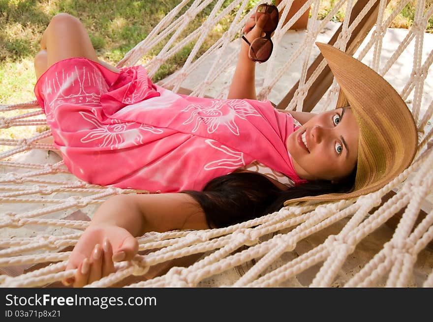 Young beautiful woman in hammock. Young beautiful woman in hammock