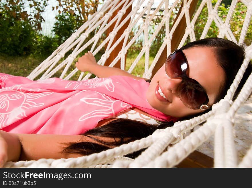 Young beautiful woman in hammock. Young beautiful woman in hammock