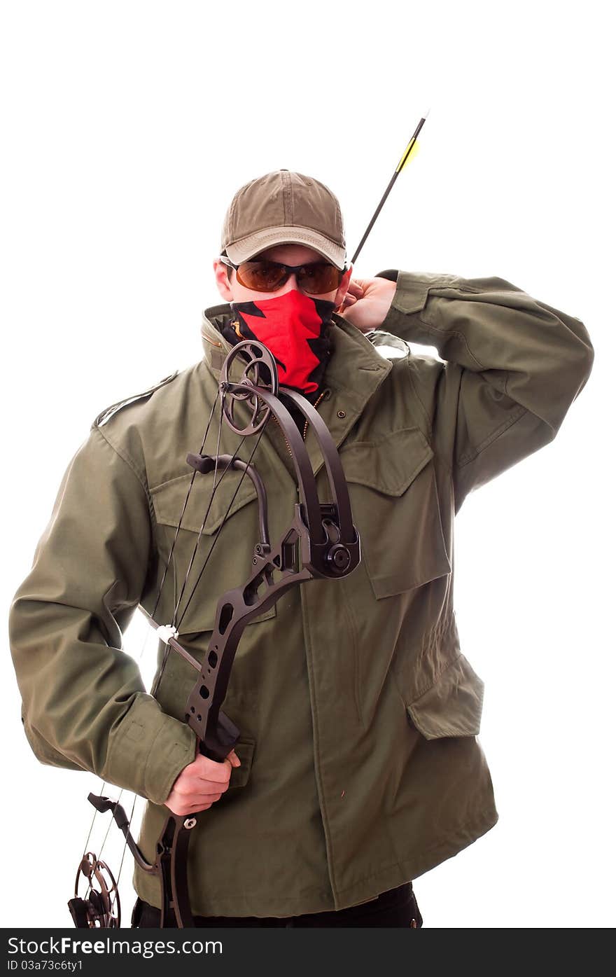 Bow-hunter in green jacket with bow and arrow. Bow-hunter in green jacket with bow and arrow