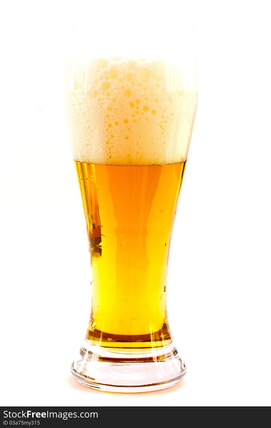 Light beer fresh in a glass of beer close up. Light beer fresh in a glass of beer close up