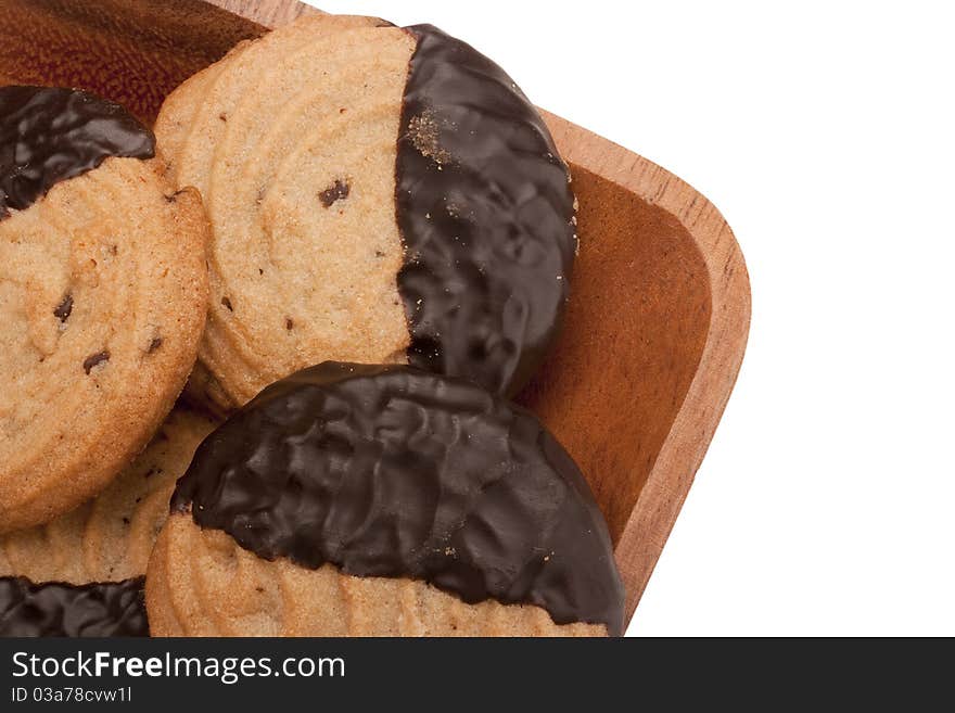 Biscuit dough with chocolate in a wooden bowl. Biscuit dough with chocolate in a wooden bowl.