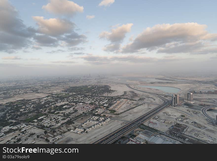 View over Dubai from tallest building Burj Dubai in the world.