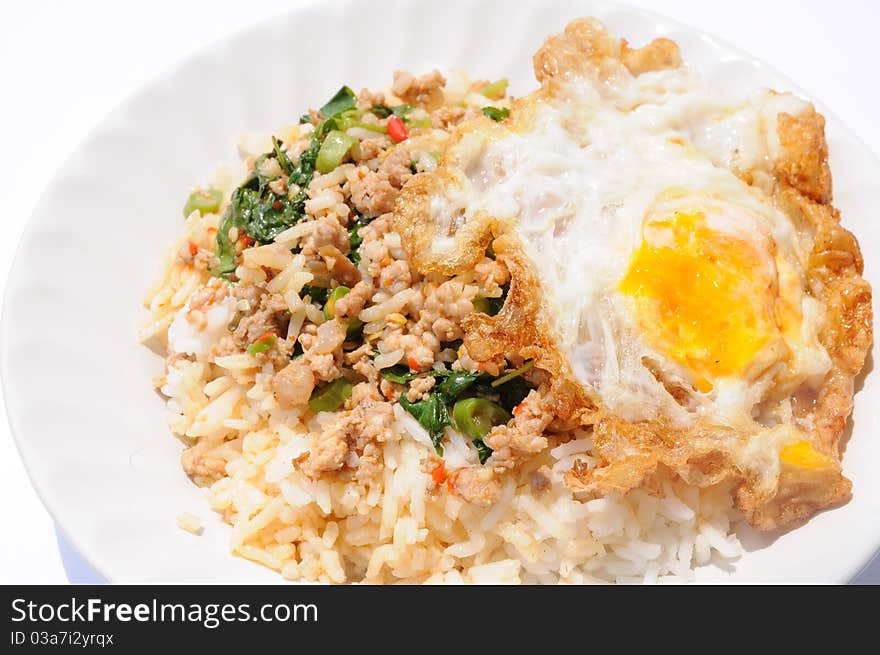 Power fried pork chop with egg on rice. Power fried pork chop with egg on rice.