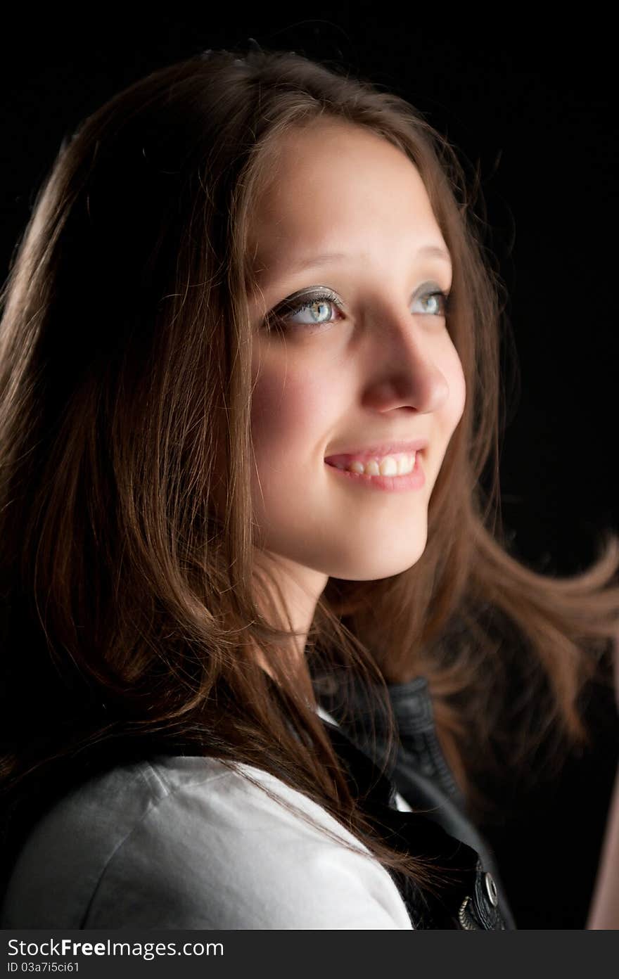 Closeup portrait of a happy young woman smiling. Closeup portrait of a happy young woman smiling