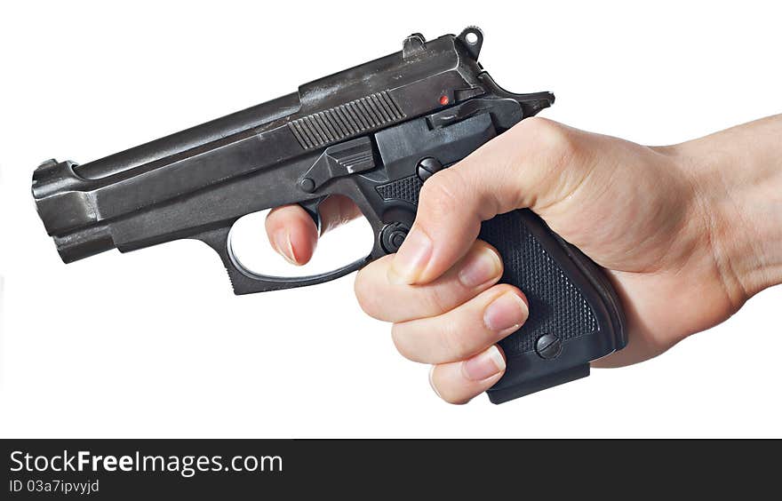 Black handgun in hand of a young man.