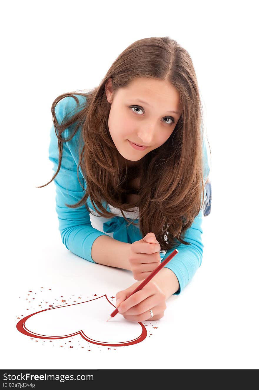 Young woman draws a pencil on a white floor. Isolated on white. Young woman draws a pencil on a white floor. Isolated on white