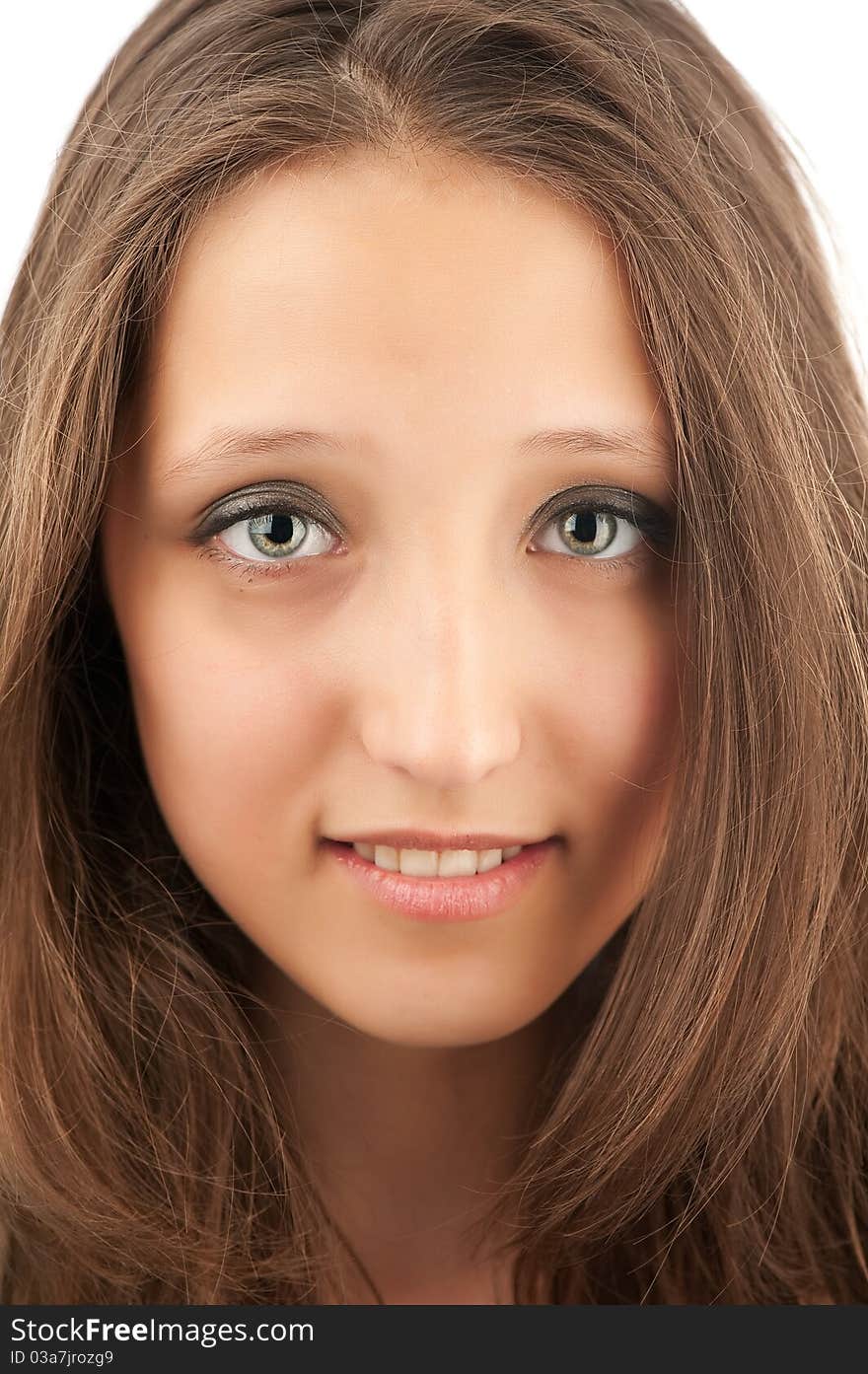 Closeup portrait of a happy beautiful young girl