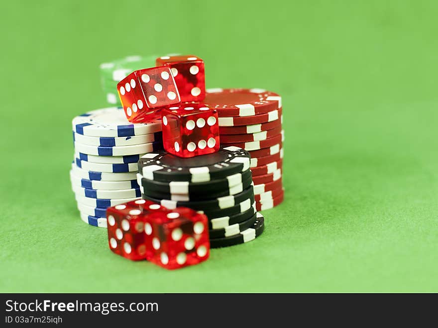 Stacks of casino chips and dice