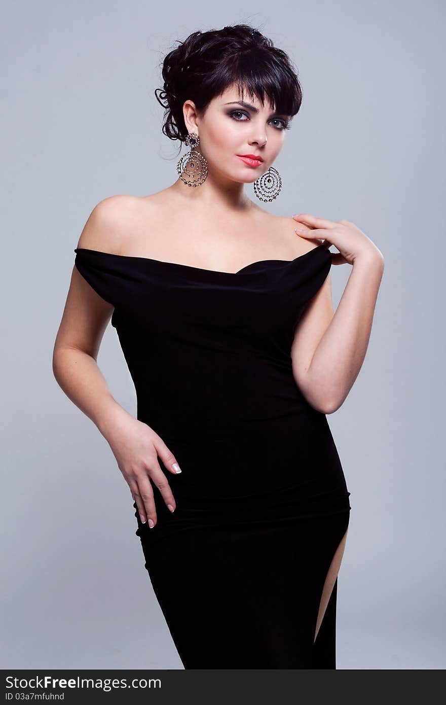 Portrait of a gorgeous woman in black dress