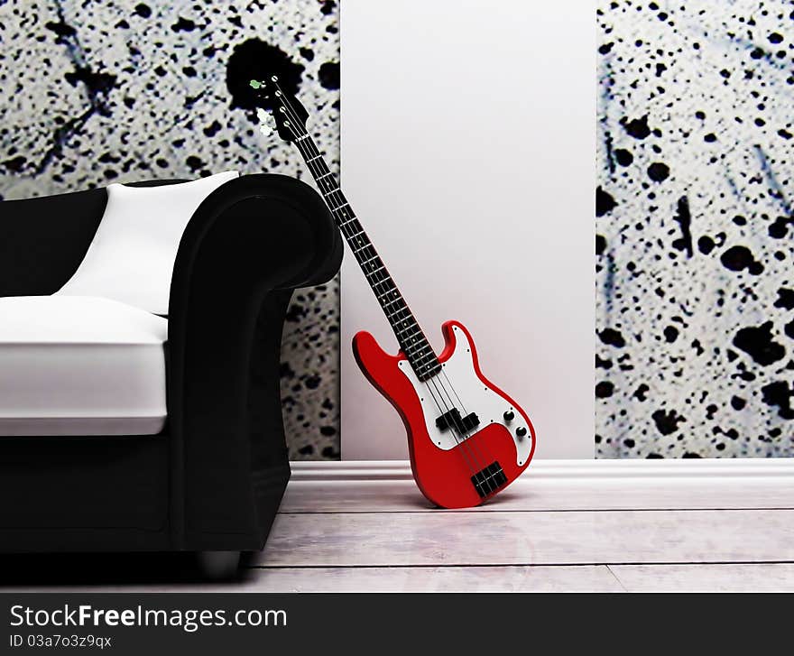 This is a modern interior with a sofa and a guitar