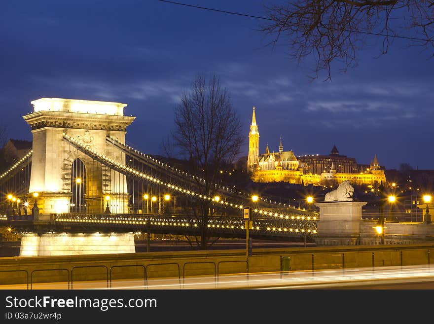 View of Budapest with the Chain Bridge and the Matthias Church on the other bank of River Danube in the background in Hungary