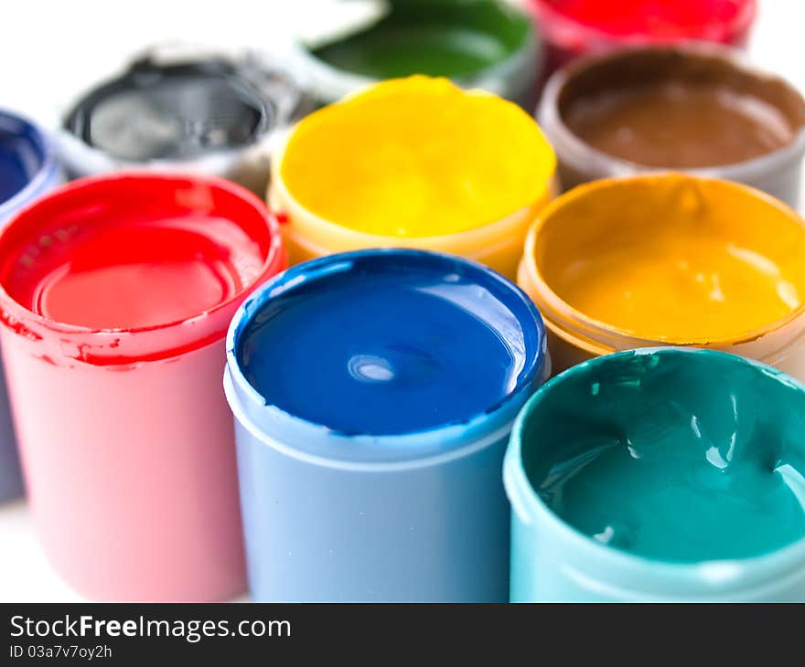 Gouache paints in plastic buckets