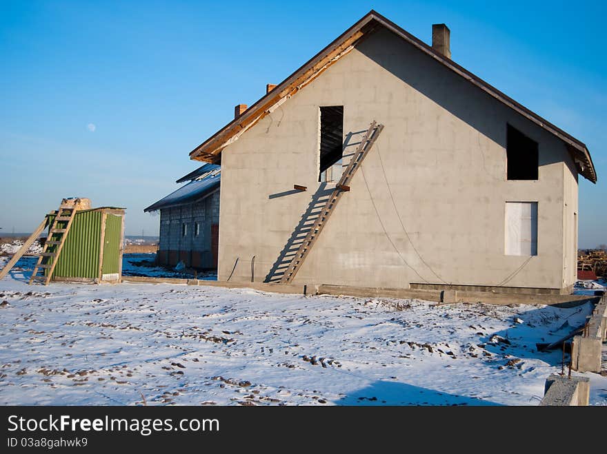 Construction of residential house in winter. Construction of residential house in winter