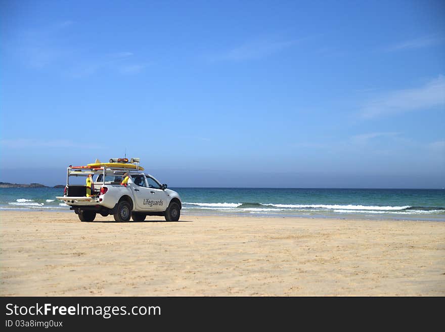 Lifeguards rescue vehicle situated on a beach in cornwall during the summer. Lifeguards rescue vehicle situated on a beach in cornwall during the summer