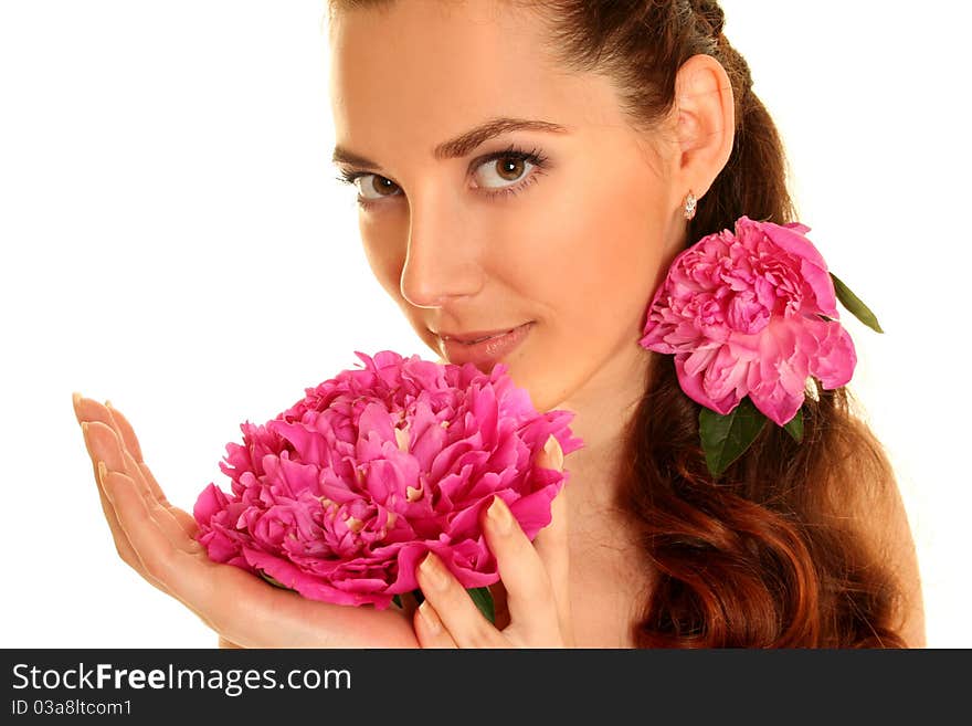 Beautiful young woman with pink flower isolated on white. Beautiful young woman with pink flower isolated on white