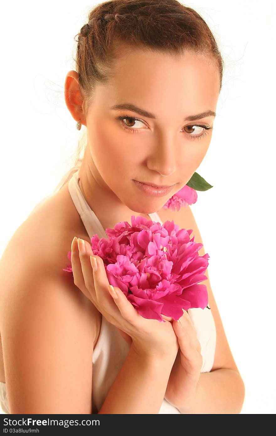 Beautiful young woman with pink flower isolated on white. Beautiful young woman with pink flower isolated on white