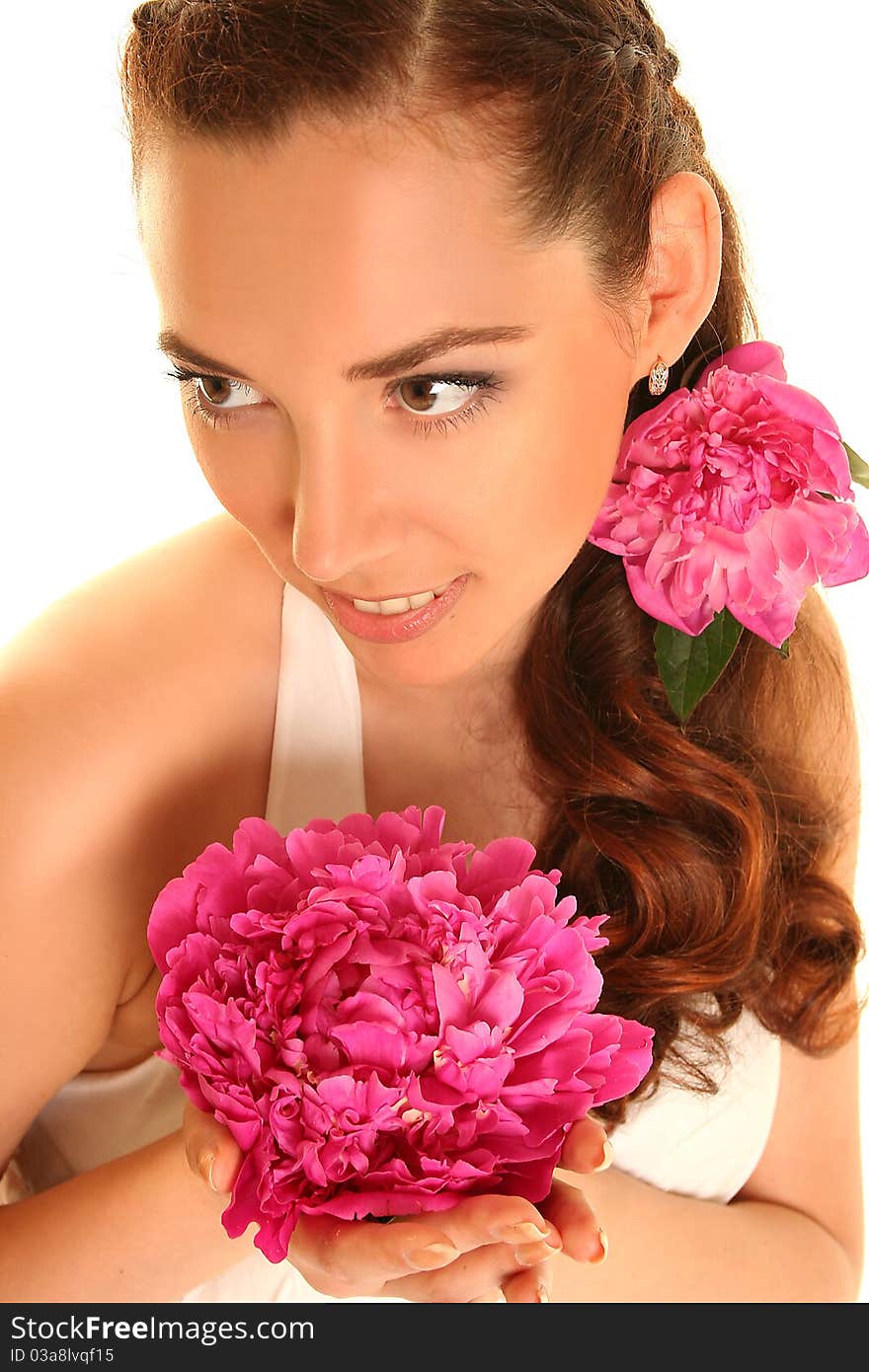 Beautiful young woman with pink flower isolated on white. Beautiful young woman with pink flower isolated on white