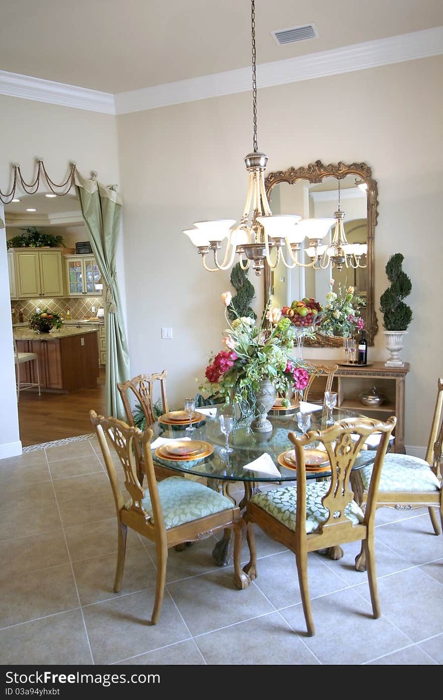 Neatly decorated breakfast table in nook. Neatly decorated breakfast table in nook