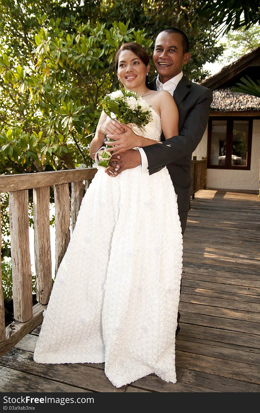 Asian Wedding Couple In Tropical Location