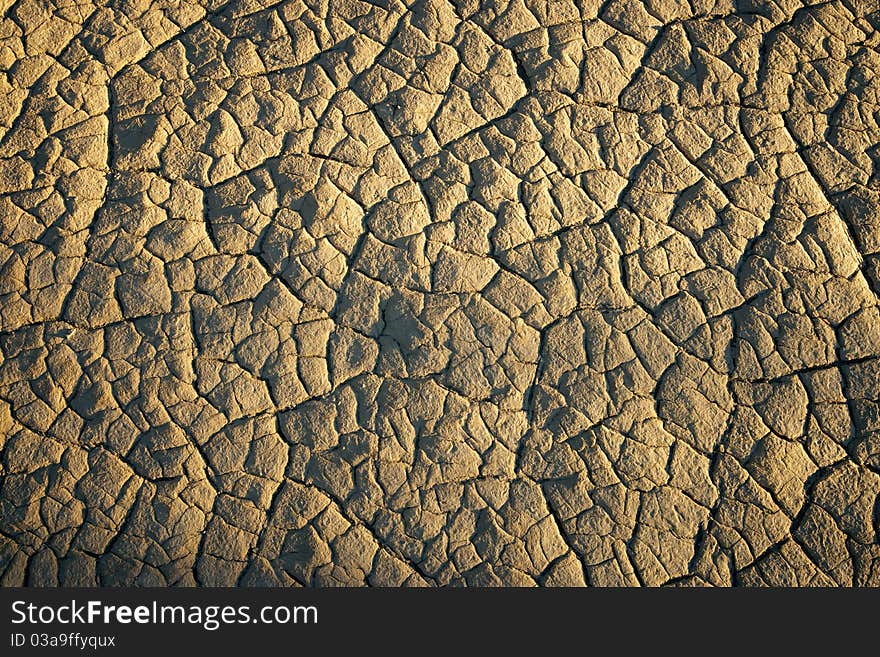 The dry, cracking floor of Death Valley National Park roasts in the summer heat. The dry, cracking floor of Death Valley National Park roasts in the summer heat.