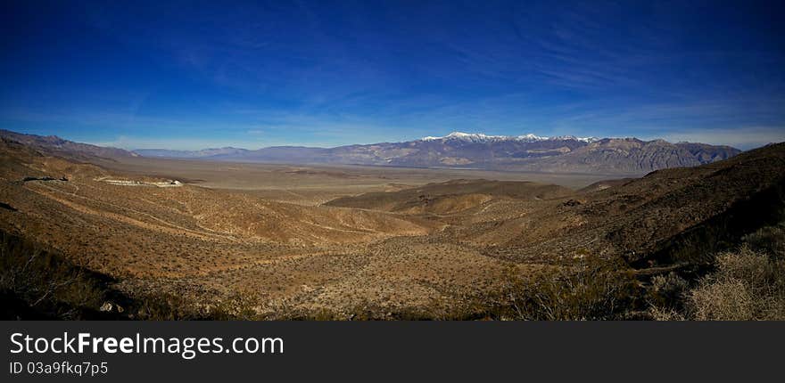 The vastness of the Panamint Valley stretches out before a lone traveler.