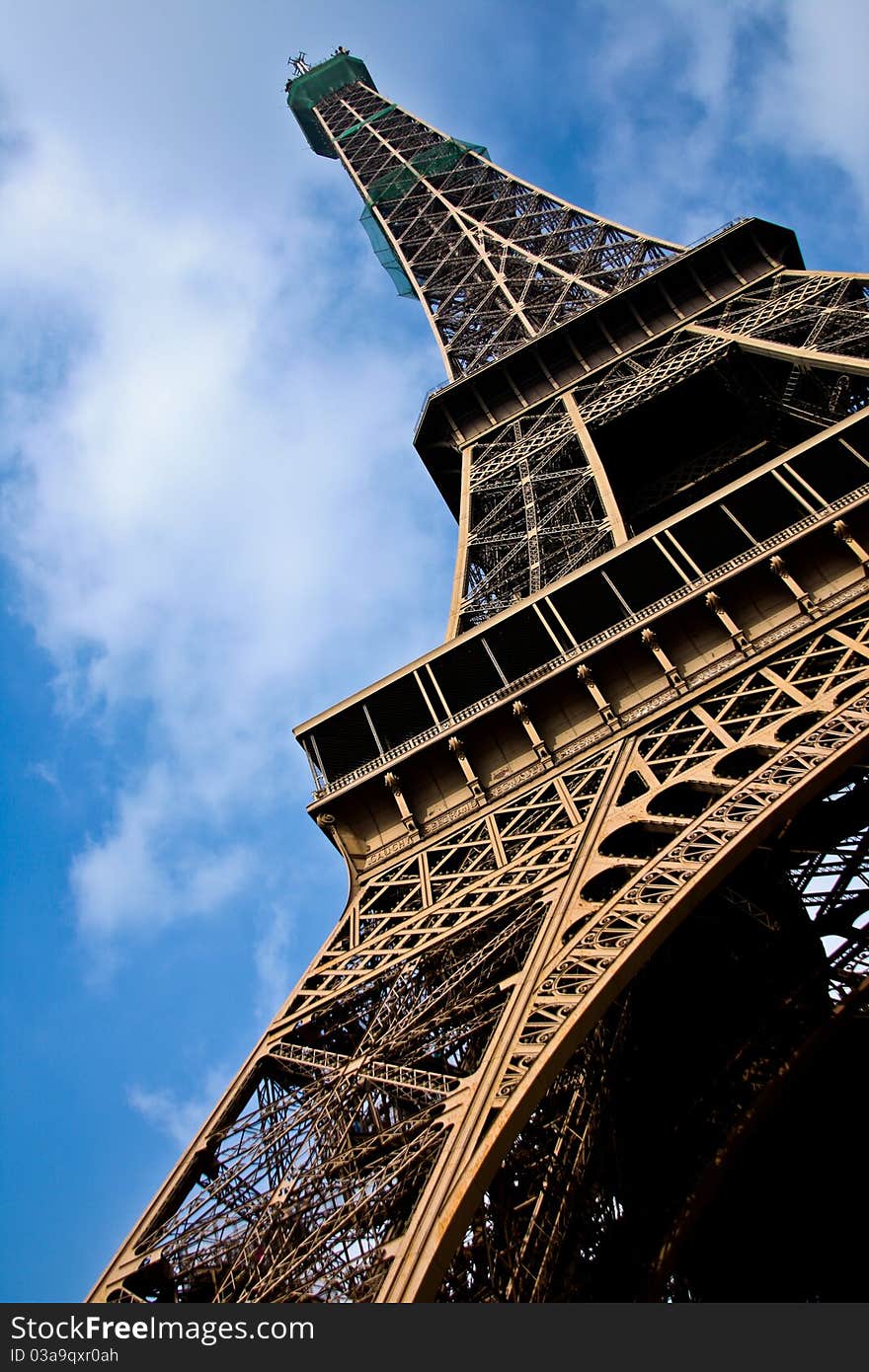 An angled shot of the Eiffel tower in Paris.