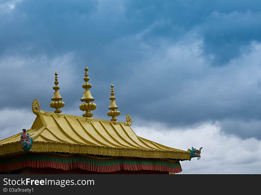 A shot of a gilded monastery roof.