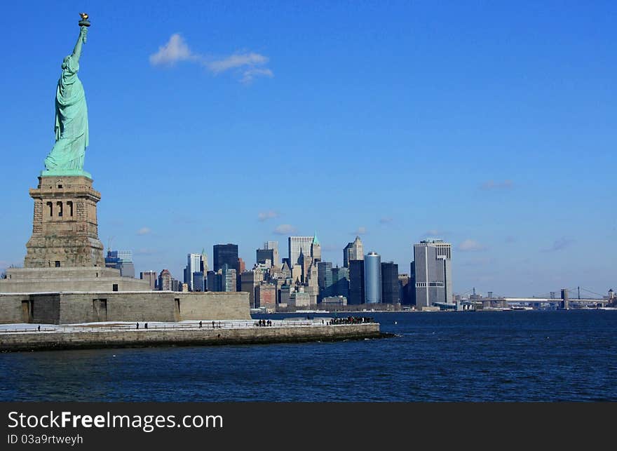 The Statue of Liberty with Manhatten in the background. The Statue of Liberty with Manhatten in the background.