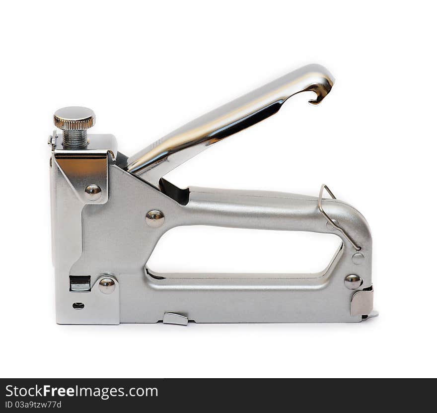 Metal tool a stapler on a white background